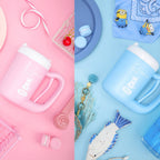 Portable dog and cat paw cleaners in pink and blue.