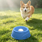 Silicone slow feeder bowl for dogs and cats placed on grass in an outdoor setting.