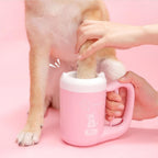 Dog paw cleaner cleaning a dog's muddy paw.