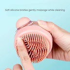 Close-up of the soft silicone bristles on a pink shampoo dispensing bath brush for gentle massage and deep cleaning on cats and dogs.
