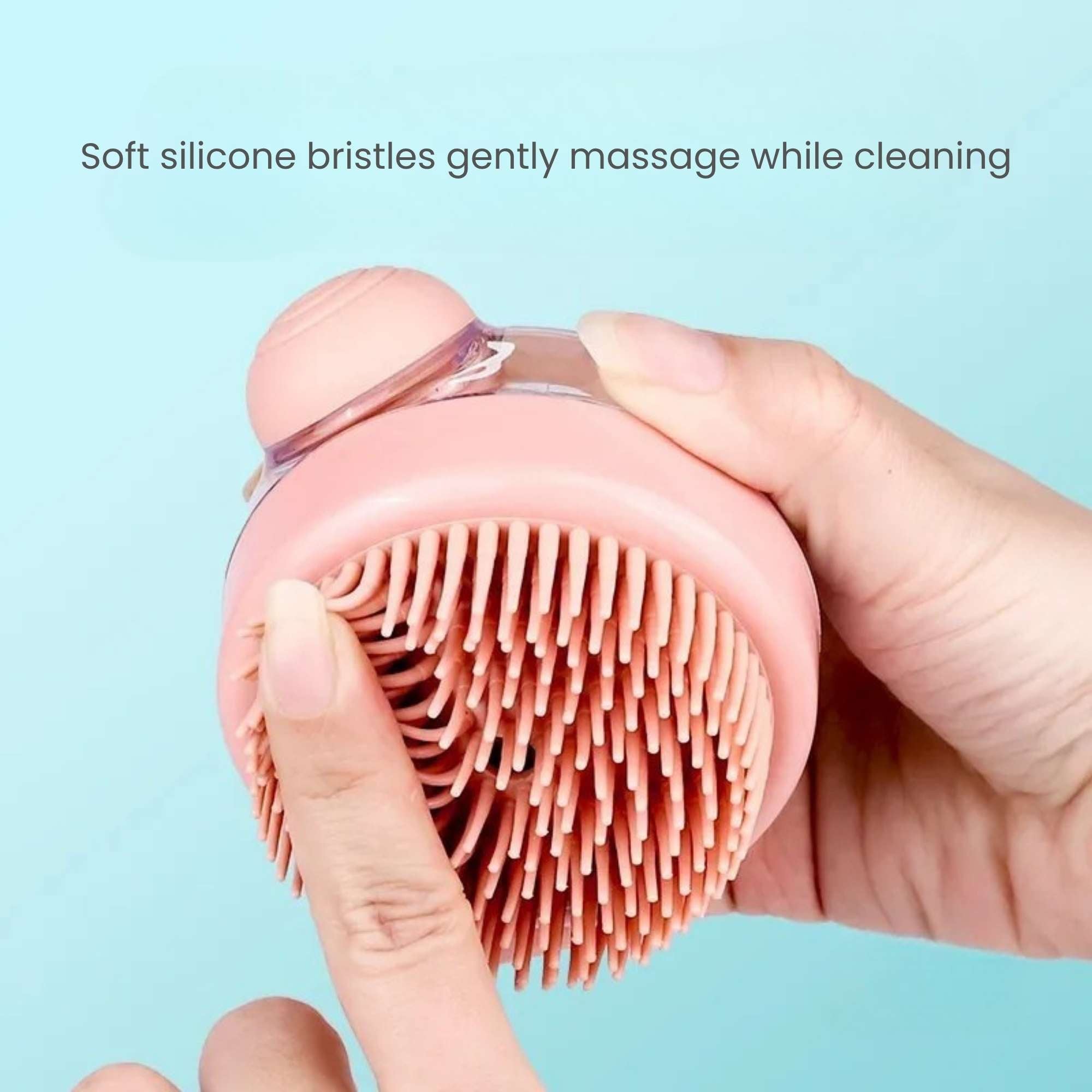 Close-up of the soft silicone bristles on a pink shampoo dispensing bath brush for gentle massage and deep cleaning on cats and dogs.