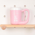 Pink portable dog and cat paw cleaner.